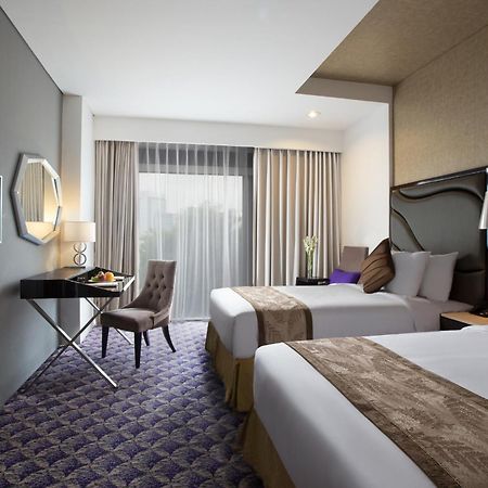 Aston Bellevue Radio Dalam Hotel Jakarta Luaran gambar