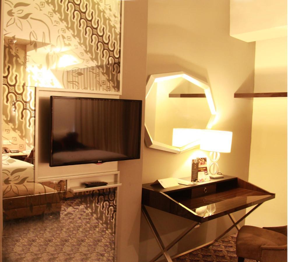 Aston Bellevue Radio Dalam Hotel Jakarta Luaran gambar